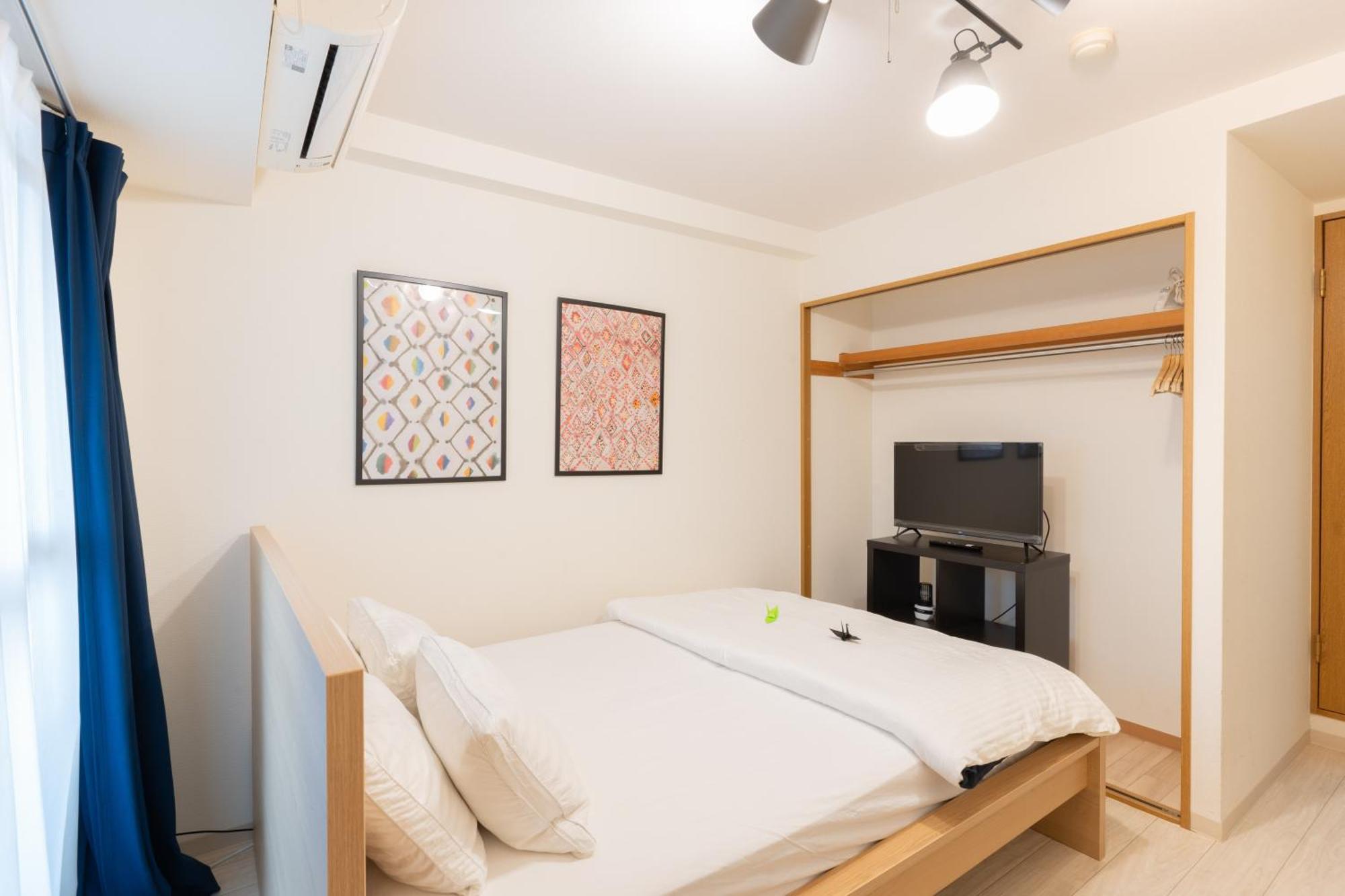 Apartemen コンフィデンスロン902