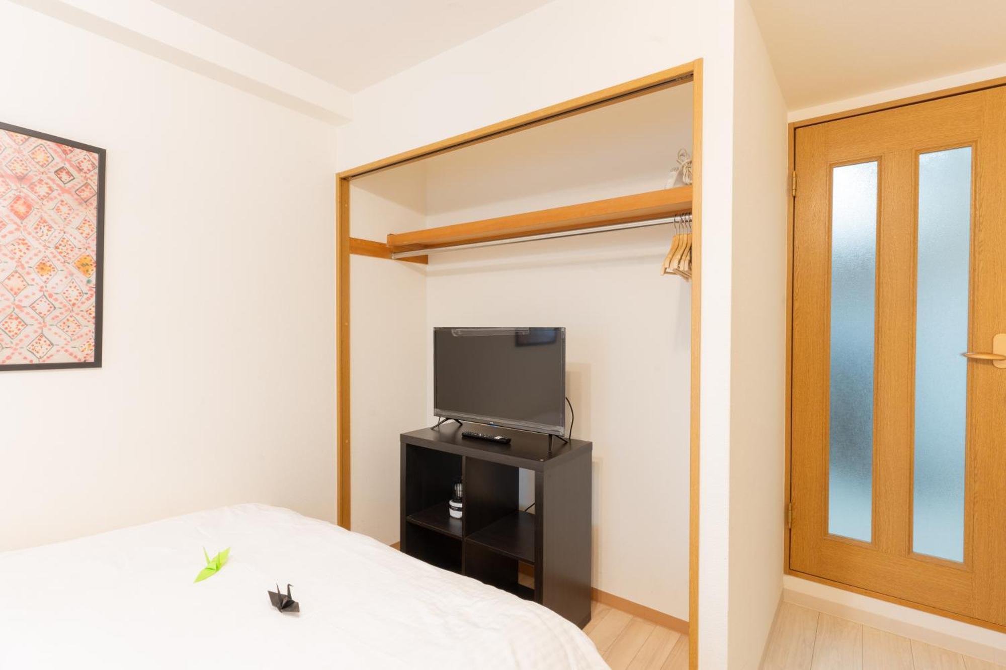 Apartemen コンフィデンスロン902